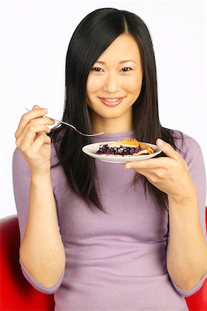 Woman Holding Plate of Food Stock Photo - Rights-Managed, Code: 700-00262685