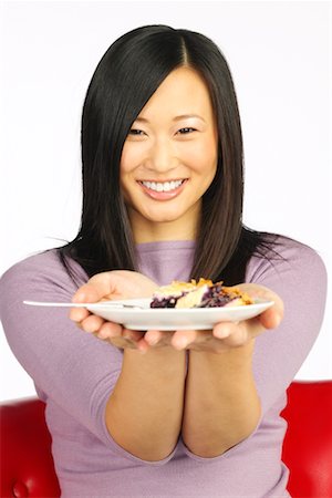 Woman Holding Plate of Food Stock Photo - Rights-Managed, Code: 700-00262682