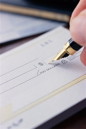 signing a check - Cheque Signing Stock Photo - Rights-Managed, Code: 700-00274905