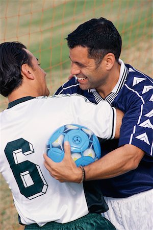 simsearch:700-00328588,k - Soccer Players Shaking Hands Stock Photo - Rights-Managed, Code: 700-00274973