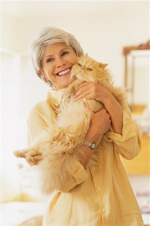 Woman Holding Cat Stock Photo - Rights-Managed, Code: 700-00279834