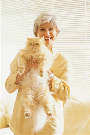 raoul minsart portrait mature - Portrait of Woman Holding Cat Stock Photo - Rights-Managed, Code: 700-00279835