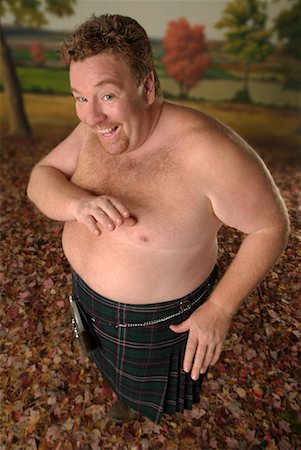 fat man with goatee - Man Wearing a Kilt Stock Photo - Rights-Managed, Code: 700-00270220
