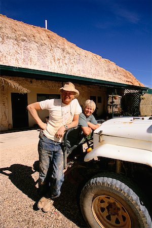 Couple by Car Coober Pedy, South Australia Australia Stock Photo - Rights-Managed, Code: 700-00270423