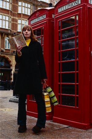 Fille de Phone Booth Leicester Square, Londres, Angleterre Photographie de stock - Rights-Managed, Code: 700-00270722