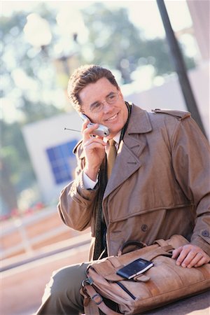 Businessman Using Cellular Phone Stock Photo - Rights-Managed, Code: 700-00285229