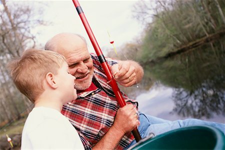 Grand-père et pêche de petit-fils Photographie de stock - Rights-Managed, Code: 700-00285244