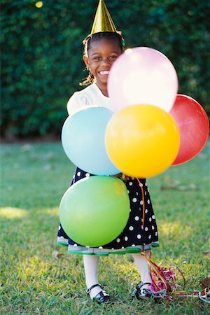Girl Holding Balloons Stock Photo - Rights-Managed, Code: 700-00285249