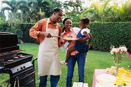 family picnic african american - Family Having Barbeque Stock Photo - Rights-Managed, Code: 700-00285252