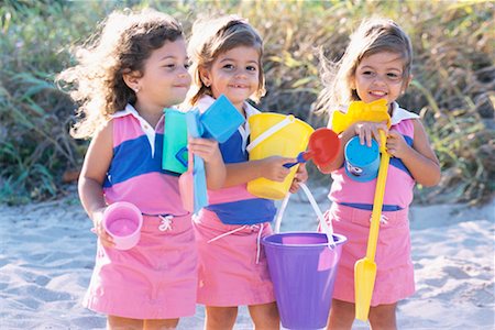 plastic toy family - Three Girls at Beach Stock Photo - Rights-Managed, Code: 700-00285307