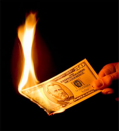 Hand Holding Burning Money Stock Photo - Rights-Managed, Code: 700-00285455