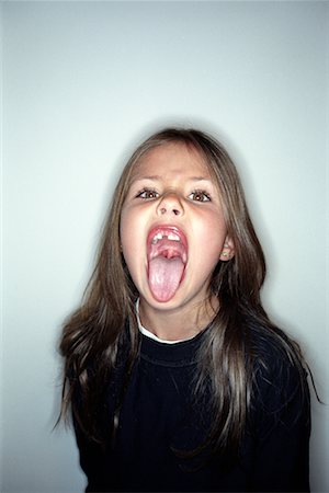 preteen girls tongue - Portrait of Girl Stock Photo - Rights-Managed, Code: 700-00285470