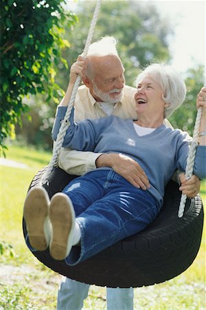 simsearch:700-00555975,k - Couple on Tire Swing Stock Photo - Rights-Managed, Code: 700-00285905