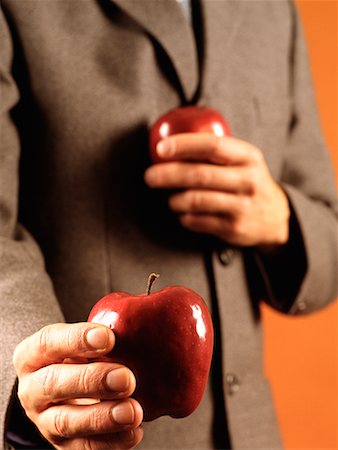 simsearch:700-00553715,k - Man Holding Apples Stock Photo - Rights-Managed, Code: 700-00285930