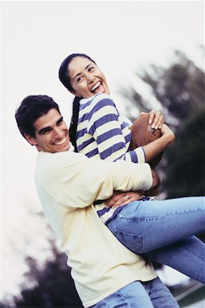 simsearch:700-00197704,k - Couple Playing Football Stock Photo - Rights-Managed, Code: 700-00286128