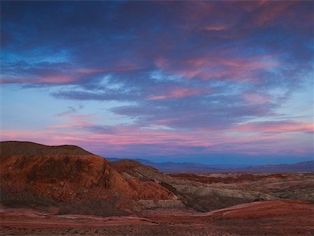 désert de mojave - Vallée rocheuse au crépuscule vallée du parc d'état de feu Nevada USA Photographie de stock - Rights-Managed, Code: 700-00286472