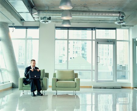 Man Waiting in Reception Area Stock Photo - Rights-Managed, Code: 700-00286749