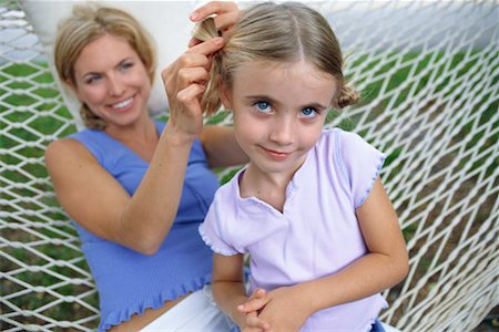 Mother and Daughter in Hammock Fotografie stock - Rights-Managed, Codice: 700-00280084