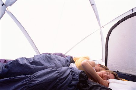 sleep in camper - Couple Sleeping in Tent Stock Photo - Rights-Managed, Code: 700-00280782