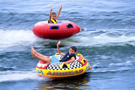 flotadores de agua - Children Water Tubing Foto de stock - Con derechos protegidos, Código: 700-00281115