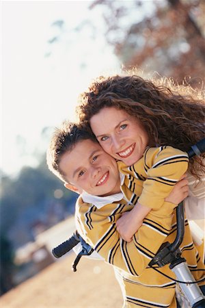 simsearch:700-00350535,k - Mother Hugging Son Foto de stock - Direito Controlado, Número: 700-00281247