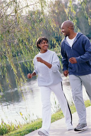 exercise black people water - Couple Power Walking Stock Photo - Rights-Managed, Code: 700-00282128