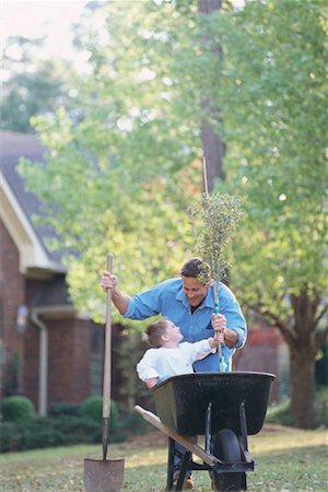 Father and Son Planting a Tree Stock Photo - Rights-Managed, Code: 700-00318388