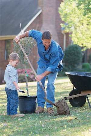 Father and Son Planting a Tree Stock Photo - Rights-Managed, Code: 700-00318390