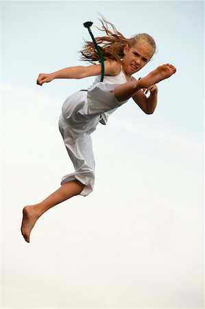 Girl doing a Karate Kick Stock Photo - Rights-Managed, Code: 700-00328209