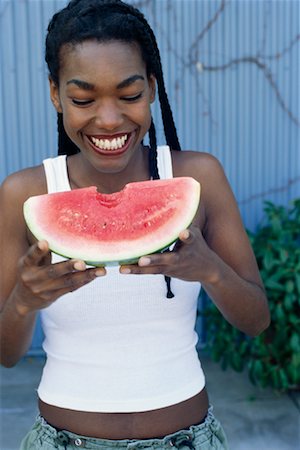 Woman Eating Watermelon Foto de stock - Con derechos protegidos, Código: 700-00328236