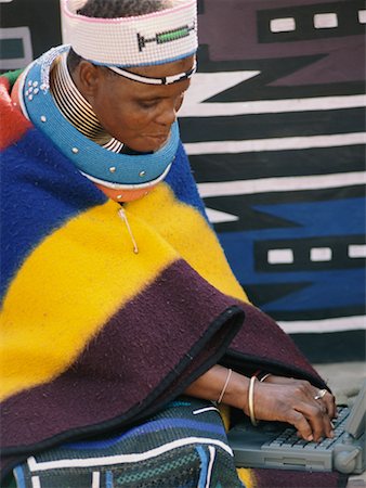 Tribal Woman with Laptop Gauteng and KwaNdebele South Africa Foto de stock - Direito Controlado, Número: 700-00328400