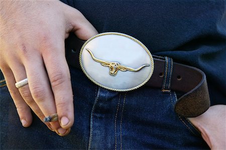 fashions cowboys for male - Close-up of Belt Buckle Stock Photo - Rights-Managed, Code: 700-00344931