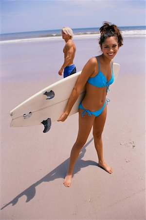 simsearch:400-04124750,k - Couple on Beach with Surfboard Stock Photo - Rights-Managed, Code: 700-00345068