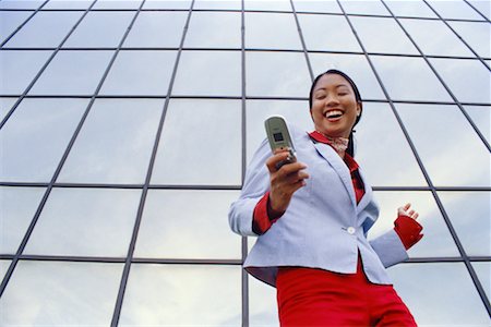 filipina businesswoman - Business Woman Using Cell Phone Stock Photo - Rights-Managed, Code: 700-00345092