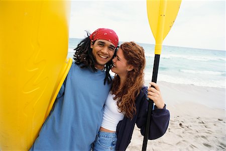Couple with Kayak on Beach Stock Photo - Rights-Managed, Code: 700-00345225