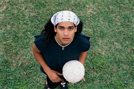 football players with dreads - Portrait d'homme avec ballon de Soccer Photographie de stock - Rights-Managed, Code: 700-00345229