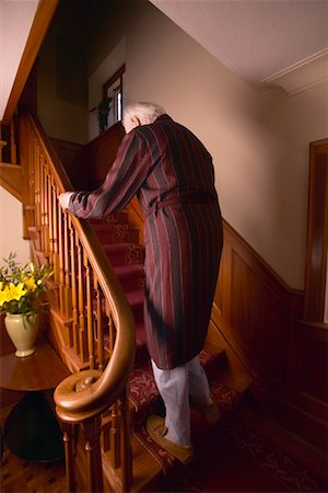 simsearch:600-01764446,k - Man Going Up Stairs Stock Photo - Rights-Managed, Code: 700-00341054