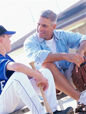 sports dad uniform - Father with Son on Baseball Diamond Stock Photo - Rights-Managed, Code: 700-00342062