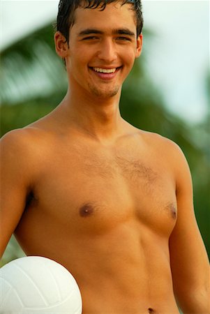 Young Man with Volleyball Stock Photo - Rights-Managed, Code: 700-00342251