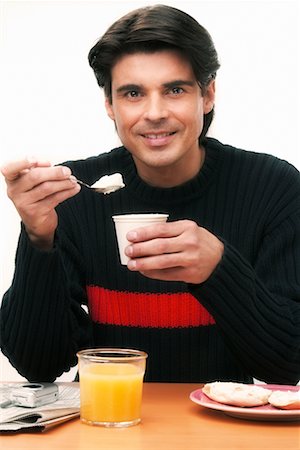 dairy technology - Man Eating Breakfast Stock Photo - Rights-Managed, Code: 700-00342394