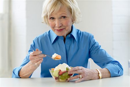 Woman with Fruit Bowl Stock Photo - Rights-Managed, Code: 700-00342933