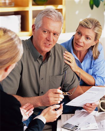 Couple with Financial Advisor Stock Photo - Rights-Managed, Code: 700-00343326