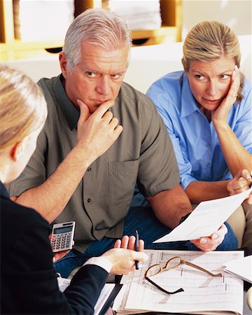 Couple with Financial Advisor Stock Photo - Rights-Managed, Code: 700-00343328