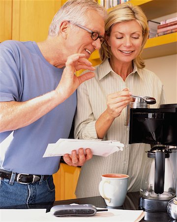 simsearch:700-00025199,k - Couple in Kitchen Making Coffee Foto de stock - Direito Controlado, Número: 700-00343364