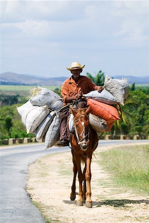 Cheval chargé de sacs de foin Cuba Photographie de stock - Rights-Managed, Code: 700-00356749