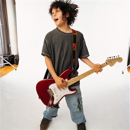 simsearch:700-00349990,k - Child Playing Electric Guitar Stock Photo - Rights-Managed, Code: 700-00357149