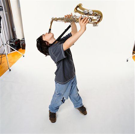 photo shoot for star - Child Playing Saxophone Stock Photo - Rights-Managed, Code: 700-00357141