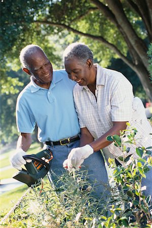 Man and Woman Gardening Foto de stock - Con derechos protegidos, Código: 700-00357501