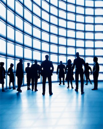 People Standing in Front of a Wall of Screens Foto de stock - Con derechos protegidos, Código: 700-00357712