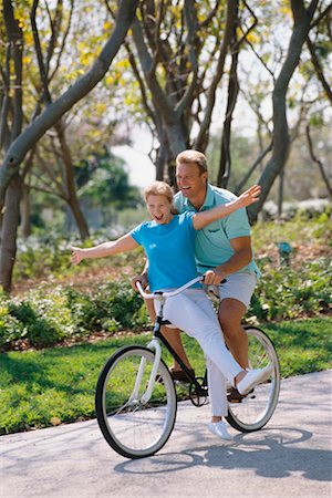simsearch:6113-06721174,k - Couple on Bicycle Having Fun Stock Photo - Rights-Managed, Code: 700-00357737